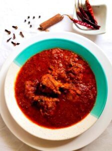 Chicken Vindaloo - The original name of this Portuguese dish is "Carne de Vinha d'Alhos", An extremely popular Goan delicacy.